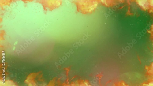 Fire border frames a vivid green central copy space creating a dramatic glowing effect for video overlays and background compositions.