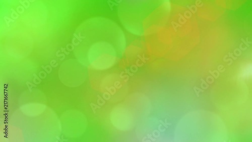 Green abstract bokeh background features glowing circular light Orbs soft focus textures and smooth gradients for modern creative design projects.