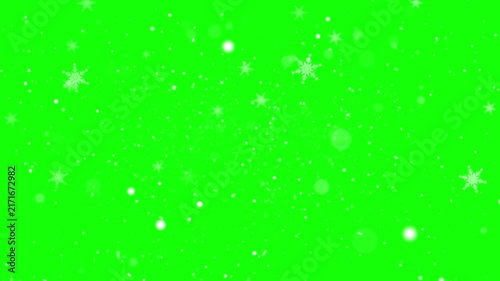 Sparkling star particles floating gently over a bright green screen background for video compositing and special effects.