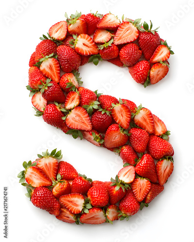 Bright red whole and sliced strawberries form a large letter C, creating a fresh fruit alphabet concept on white.