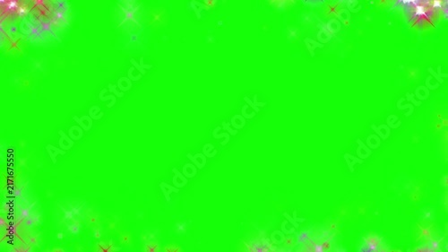 Glittering particle frame with colorful sparkles and star effects surrounds an empty green screen background.