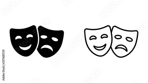 Foto Theatrical Masks: A pair of classic theatrical masks, one displaying a joyous smile and the other a somber frown, symbolizing the duality of human emotion and the performing arts