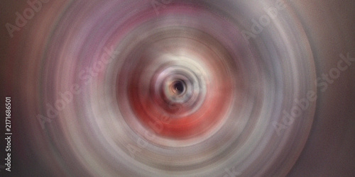 Quadro su tela Bright circular radial motion blur vortex with red and beige tones
