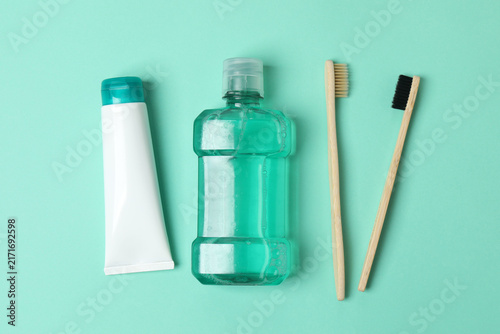 Картината върху платно Oral hygiene kit on a green background