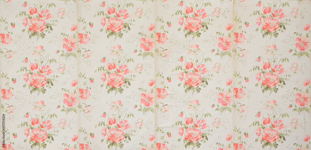 Obraz premium Old wallpaper on the wall. Old wallpaper for texture or background.