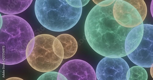 Glowing transparent spheres floating in dark space.