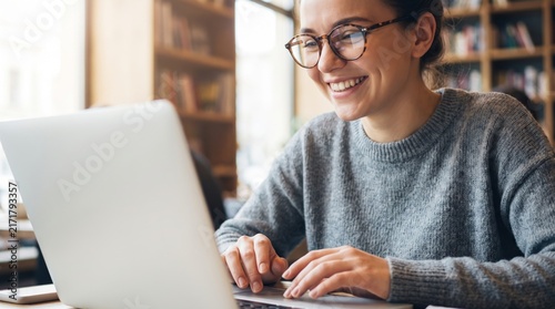 Happy woman working with laptop