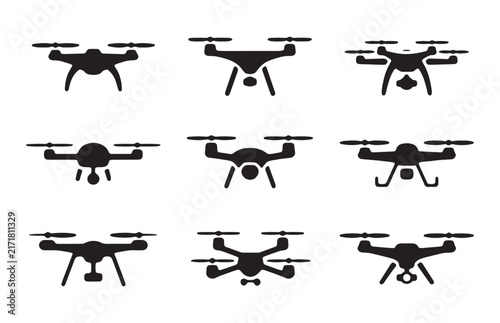Drone icons set featuring silhouettes of quadcopters with cameras and cargo used for aerial imagery.