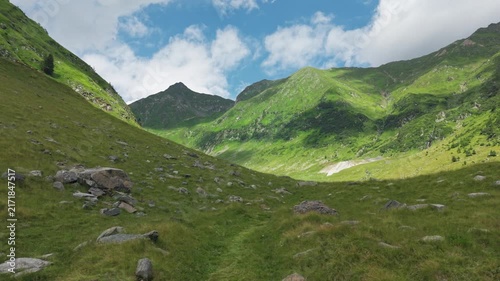 Rolling Grassland Below Rocky Carpathian Crest