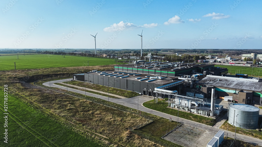 Fototapeta premium Green energy data facility in rural landscape