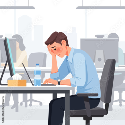 Stressed Office Worker Feeling Overwhelmed At His Desk