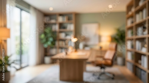 Blurred home office interior featuring a wooden desk and bookshelves in a soft focus setting. This professional workspace background provides a clean aesthetic for corporate presentations.