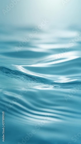 Gentle wave motion with soft light and subtle ripples in tranquil blue water
