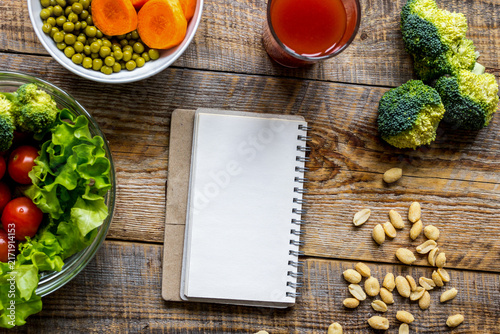 concept diet, slimming plan with vegetables top view mock up