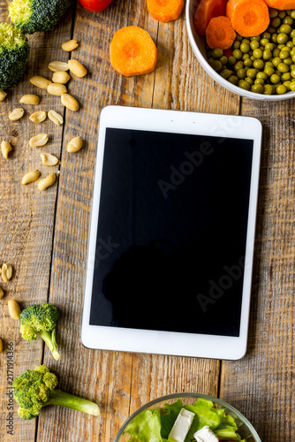concept diet and tablet with vegetables mock up