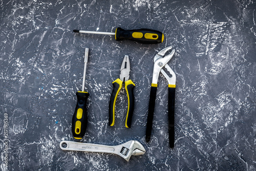 Tools for repairing top view on stone background