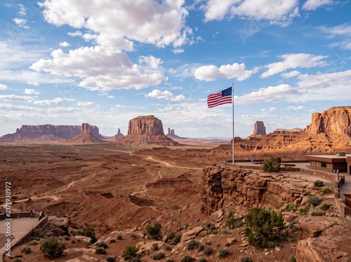 American Flag Waving in a Desert Landscape with Monument Valley Buttes
