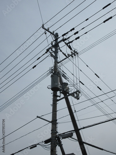 Obraz na płótnie 電柱に付いている柱上変圧器（縦撮影）