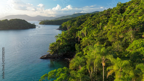 Aerial view of the calm and green lagoon with crystal clear water near the island of Ilha Grande, Brazil