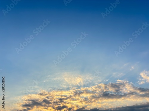 Bild auf Leinwand A wide-angle horizontal landscape photograph capturing brilliant crepuscular ray
