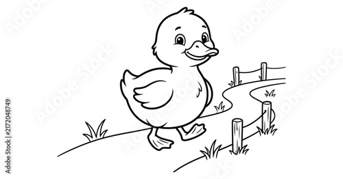 фотографія A cute little duckling walking along a path in this simple black and white print