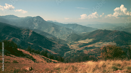 Panoramic Scenic Mountain Valley Landscape with Vintage Film Color Grading