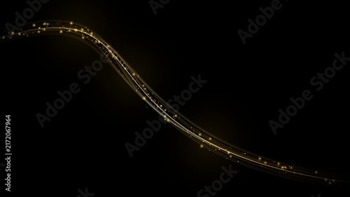 Abstract golden light trail with glowing particles on black background 4k video
