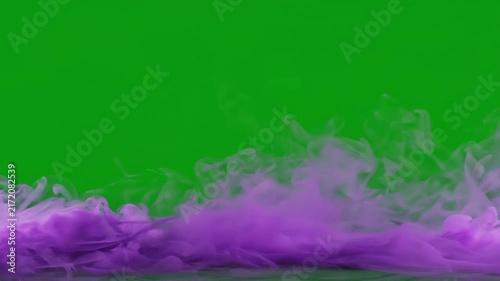 Purple Smoke Flowing On Green Screen Background Chroma Key VFX Element.