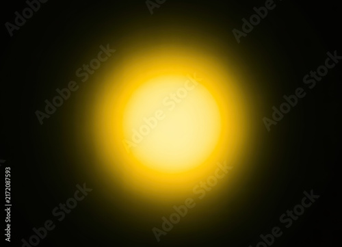 Bright yellow-white circular light glow with soft gradient edges