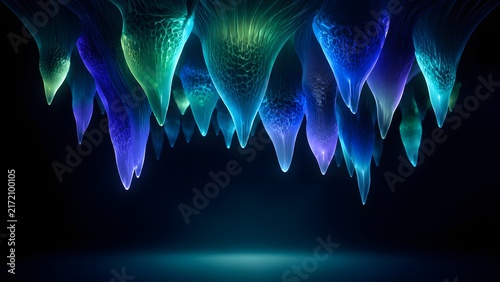 Glow in the dark stalactites hanging from cave ceiling with blue and green light