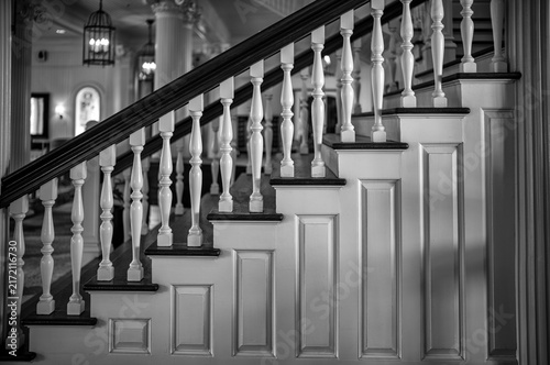 Old Wooden Stairway with Bannisters and Facade.