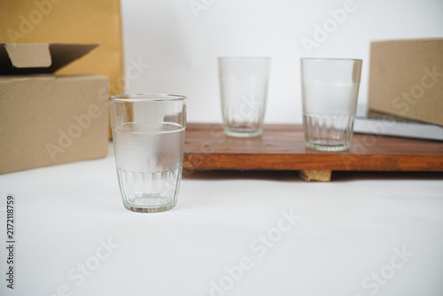 Paper shopping bag and takeaway box with water glass