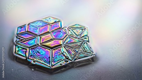 Abstract Iridescent Metallic Geometric Crystal Surface