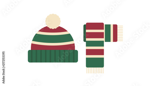 Winter knit hat and scarf set featuring classic green, red, and beige stripes with a fluffy white pompom on a solid white background.