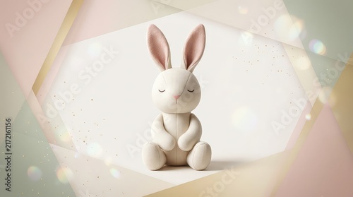 Cute minimalist plush bunny toy sitting in a peaceful meditation pose