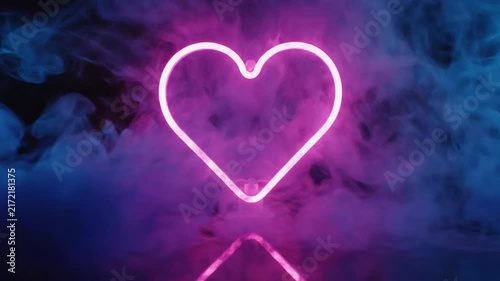 Heart Shaped Neon Light Glowing in Dark Studio