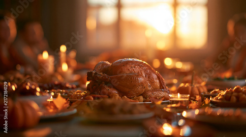 Roasted Turkey on Thanksgiving Dinner Table with Candles