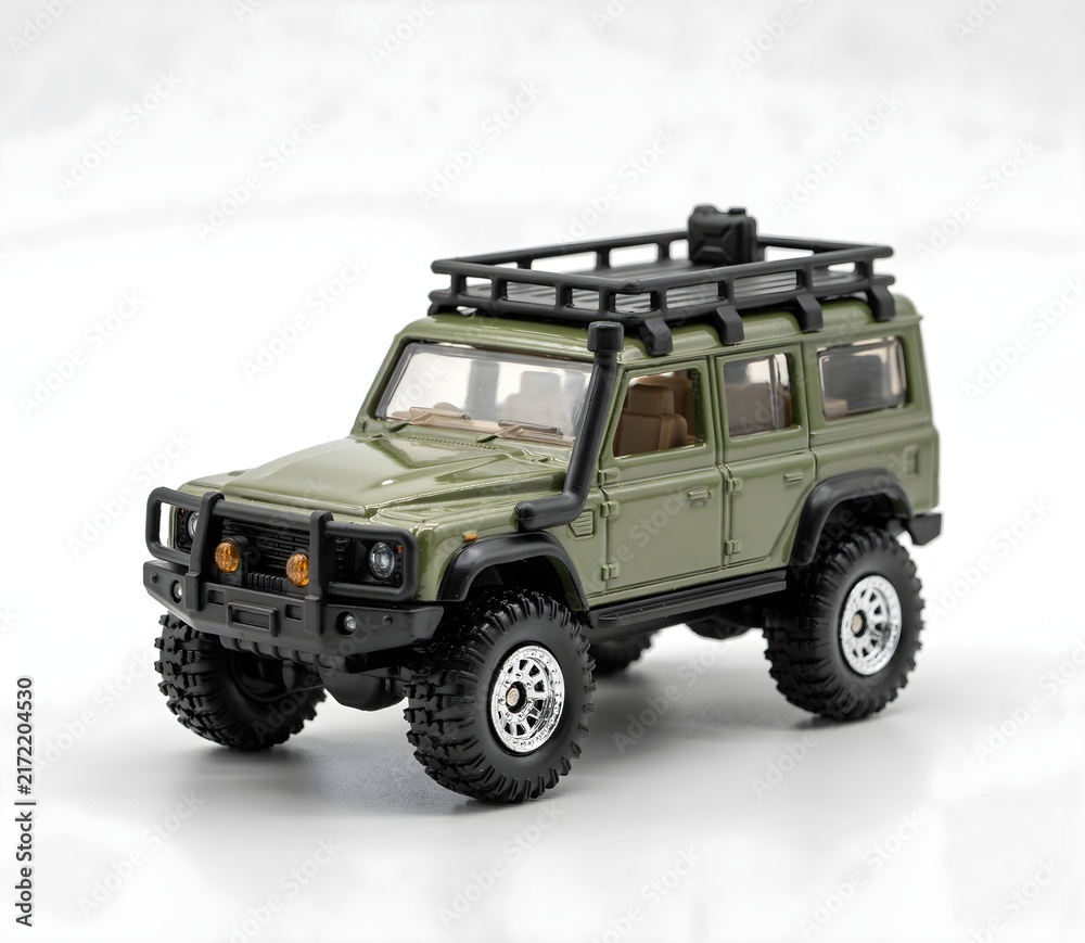 Obraz premium Green Die-Cast Off-Road 4x4 SUV Miniature Toy on White Background