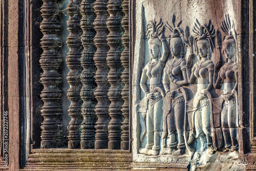 Apsara dancers stone carvings details in Angkor Wat temple, Siem Reap, Cambodia
