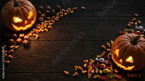 A stunning halloween background featuring a 3d candy and jack o' lantern border perfect for spooky season designs and festive celebrations