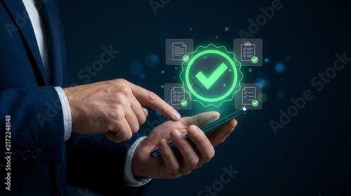 Hands holding smartphone with green approval checkmark verification icon