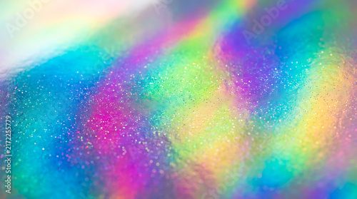 Vibrant abstract swirls of pink, green, blue, and yellow gradient texture background, abstract background