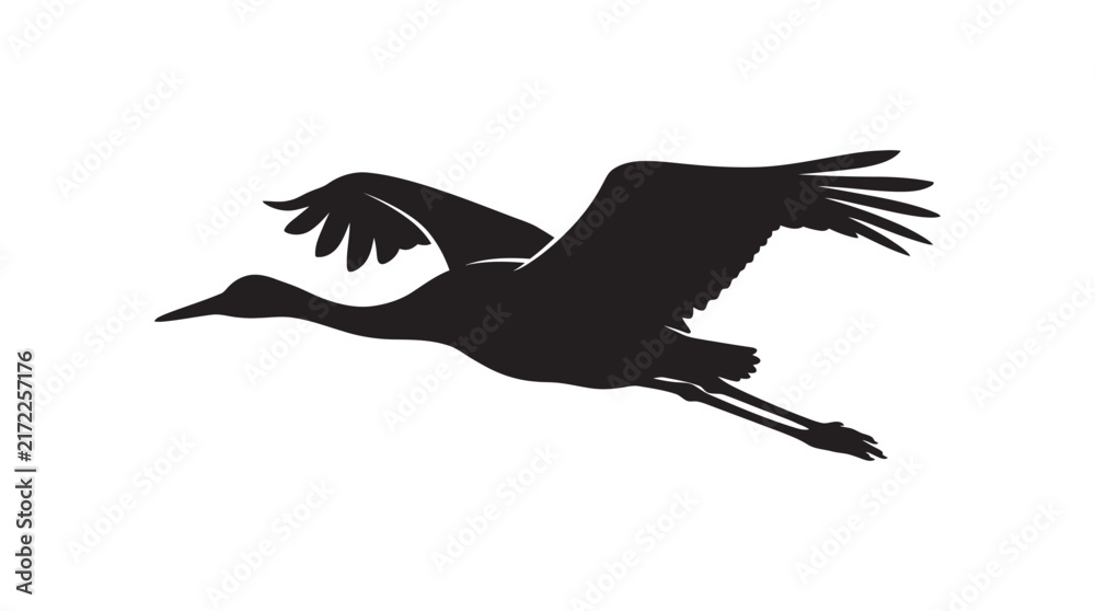 Naklejka premium Flying crane bird with outstretched wings a black silhouette