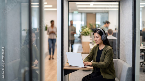 Neurodivergent friendly workplace accommodation with a quiet focus pod and headphones