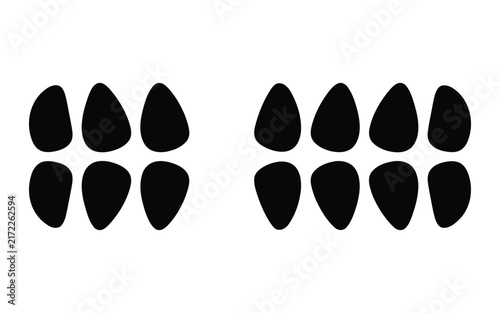 Black silhouette shapes, two groups of teardrop or petal