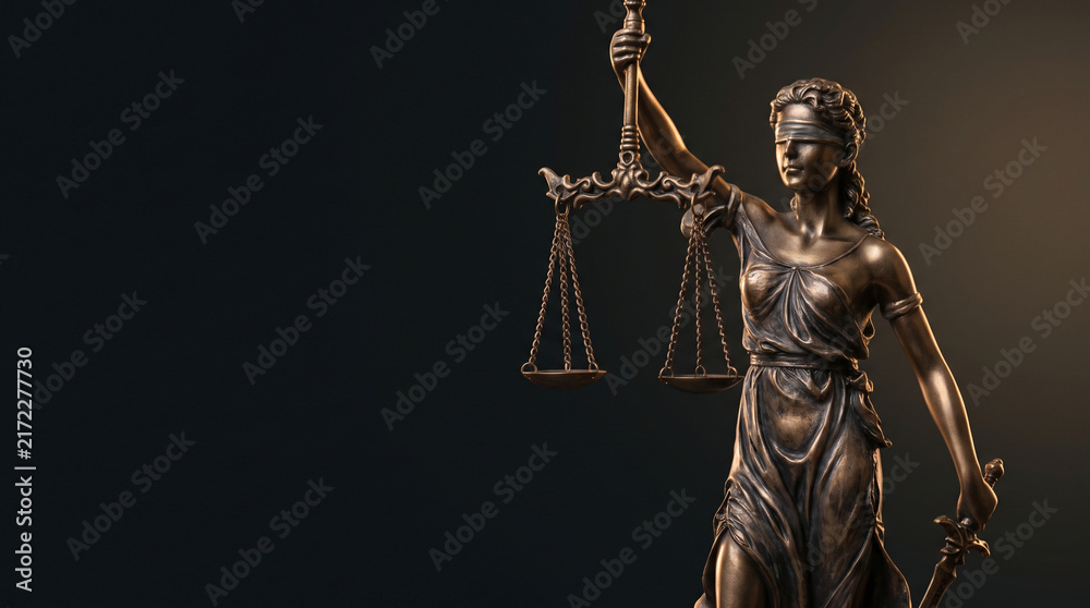 Bronze Lady Justice Statue Holding Scales and Sword on Dark Background with Copy Space for Legal Law Firm Corporate Website Banner and Courthouse Concepts