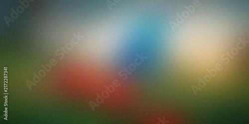 Soft blurred gradient texture dark red blue yellow green mystic backdrop.