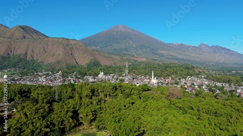 Aerial view of Mount Rinjani volcano rising above Sembalun village in East Lombok Indonesia