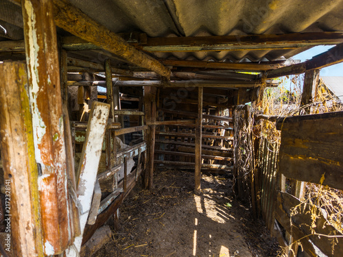 Fotografía Interior of dilapidated wooden animal enclosure in Kyrgyzstan