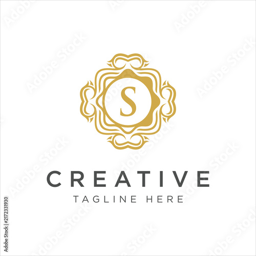 A sophisticated monogram logo featuring an ornate design with a stylized letter 'S'. Ideal for branding and identity projects.